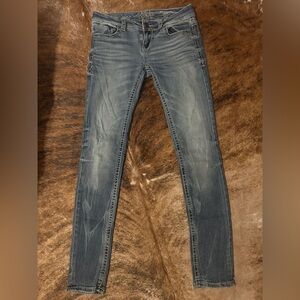 Buckle Skinny Jeans